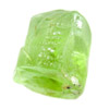 Peridot crystal before faceting