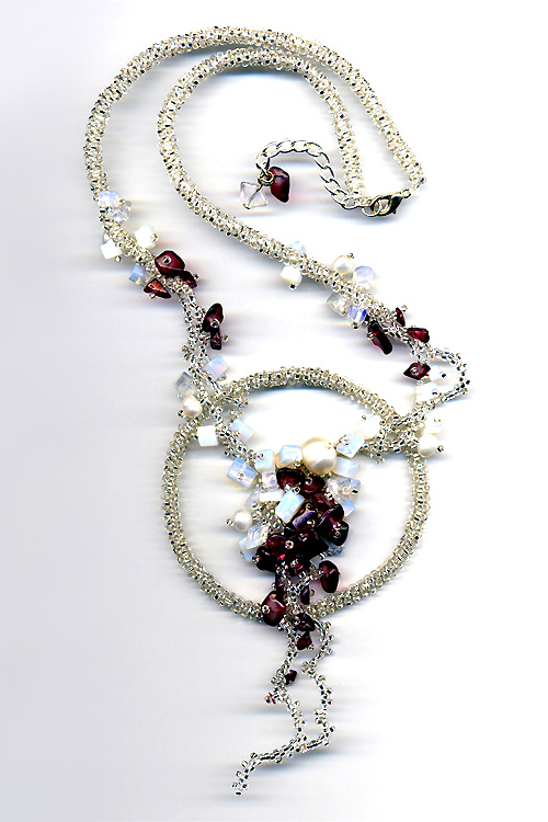 Jewelry in garnet by Albina Polyanskaya