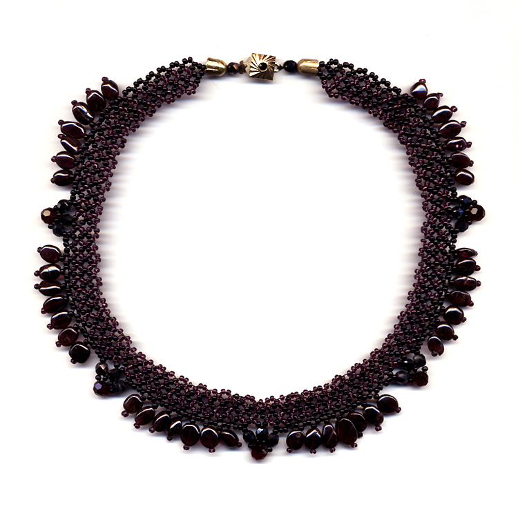 Jewelry in garnet by Albina Polyanskaya