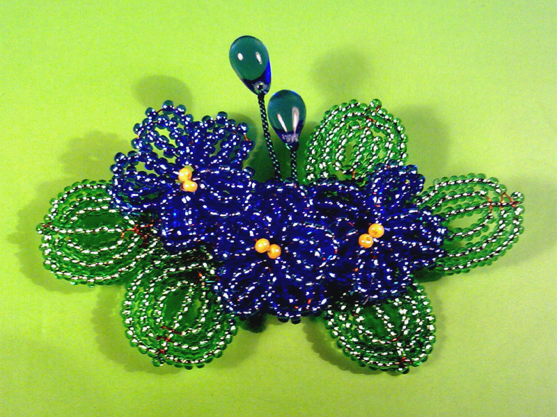 Victoriya Katamashvili. Beaded violet flowers in decoration