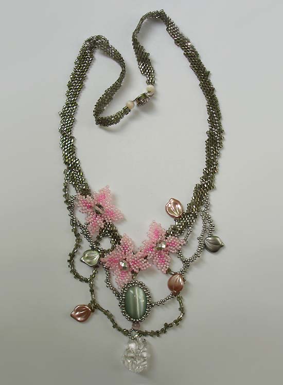 Jewelry in clear rock crystal and beads by Albina Polyanskaya