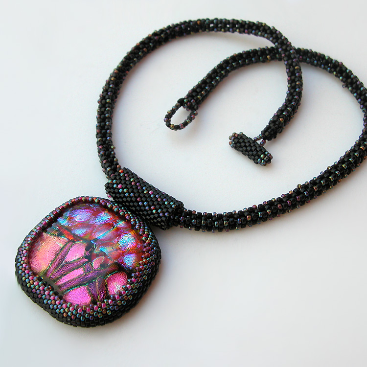 Dichroic glass cabochons by Linda Roberts
