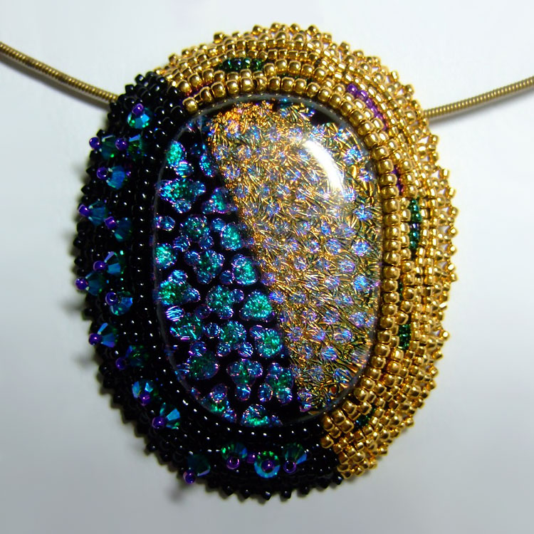 Dichroic glass cabochons by Linda Roberts