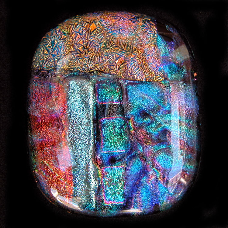 Dichroic glass cabochons by Linda Roberts
