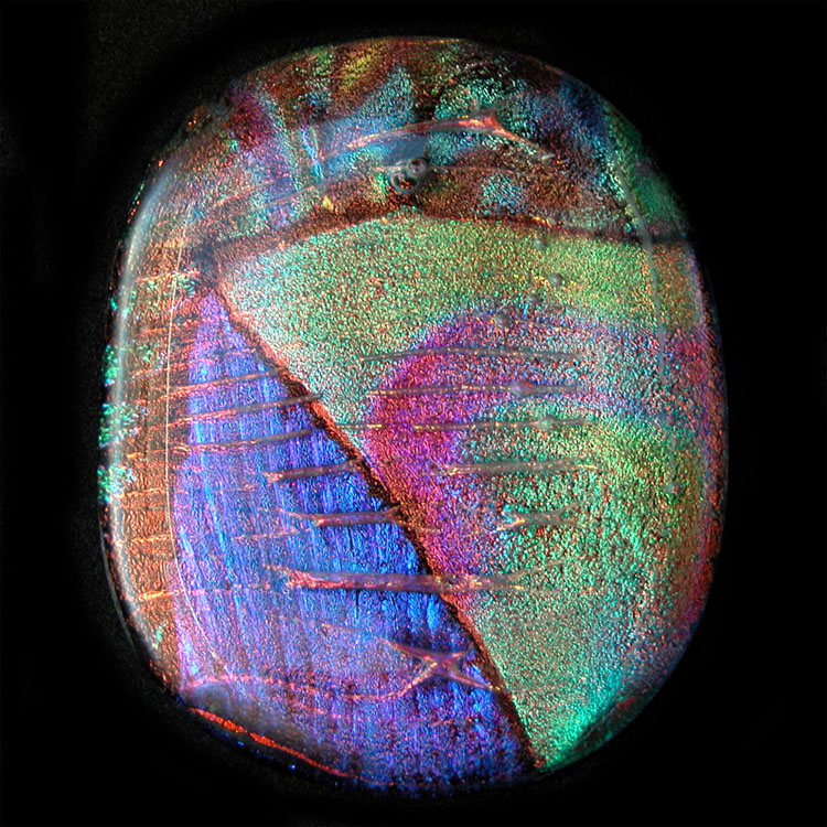 Dichroic glass cabochons by Linda Roberts