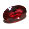 Cut ruby gemstone with inclusions