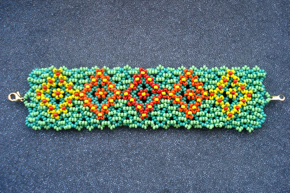 Netting base embroidery by Victoria Katamashvili
