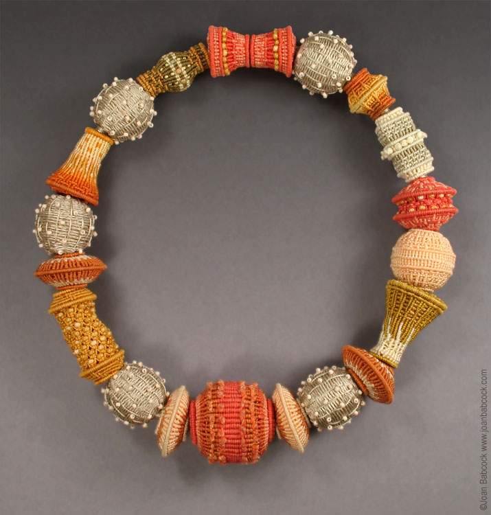 Fiber art jewelry by Joan Babcock