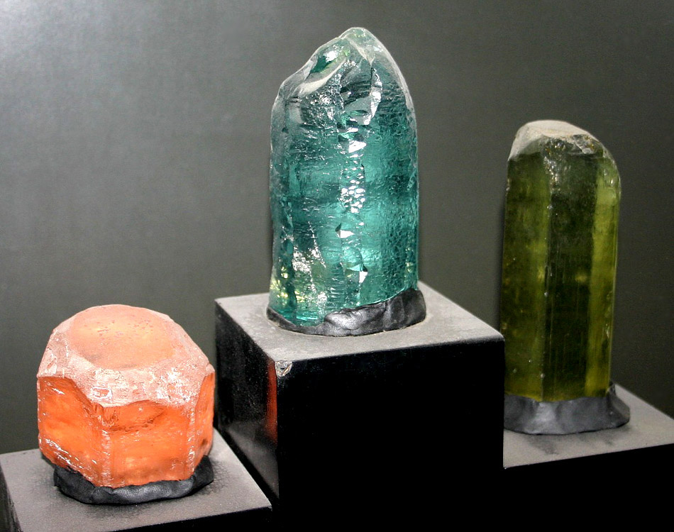 Three varieties of beryl: morganite, aquamarine and heliodor