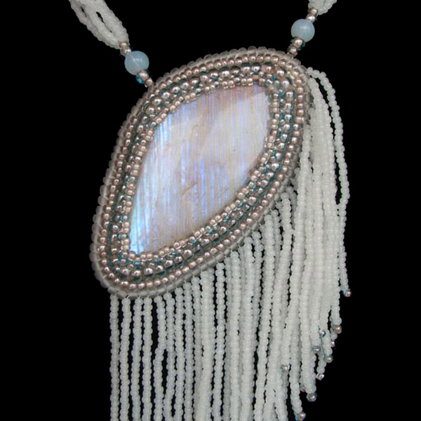 Belomorite cabochon in a piece of beaded jewelry