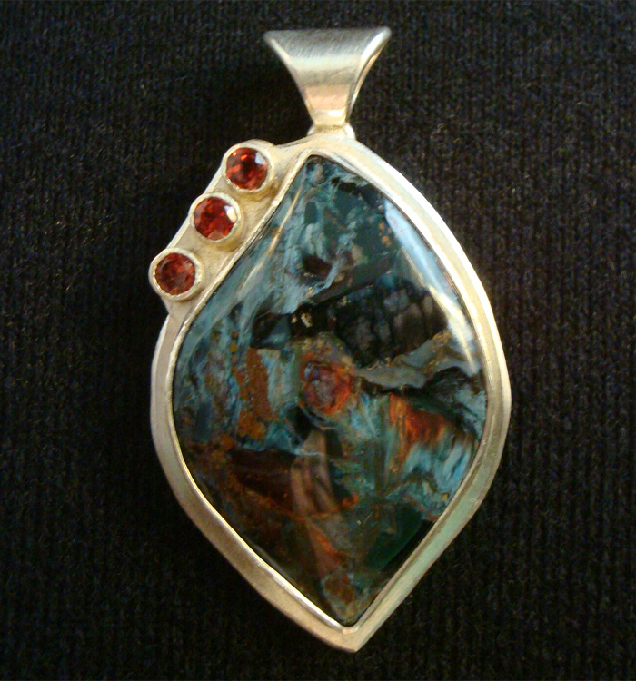 African pietersite with garnet accents set in Sterling Silver