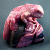 Iguana carved from a single block of rhodonite