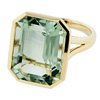 18 kt. gold ring set with an emerald-cut prasiolite