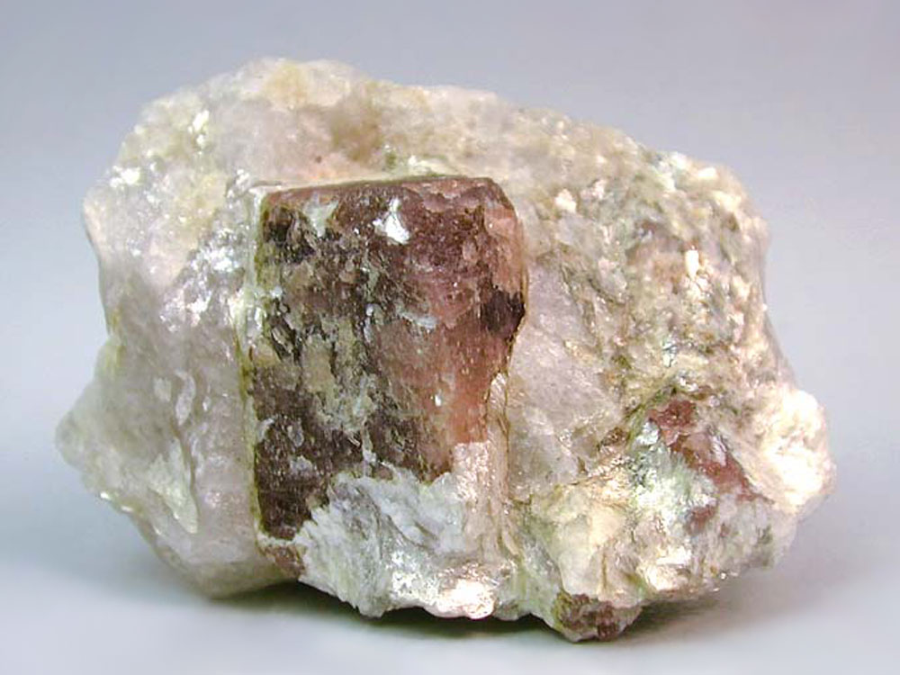 Wine colored andalusite associated with mica