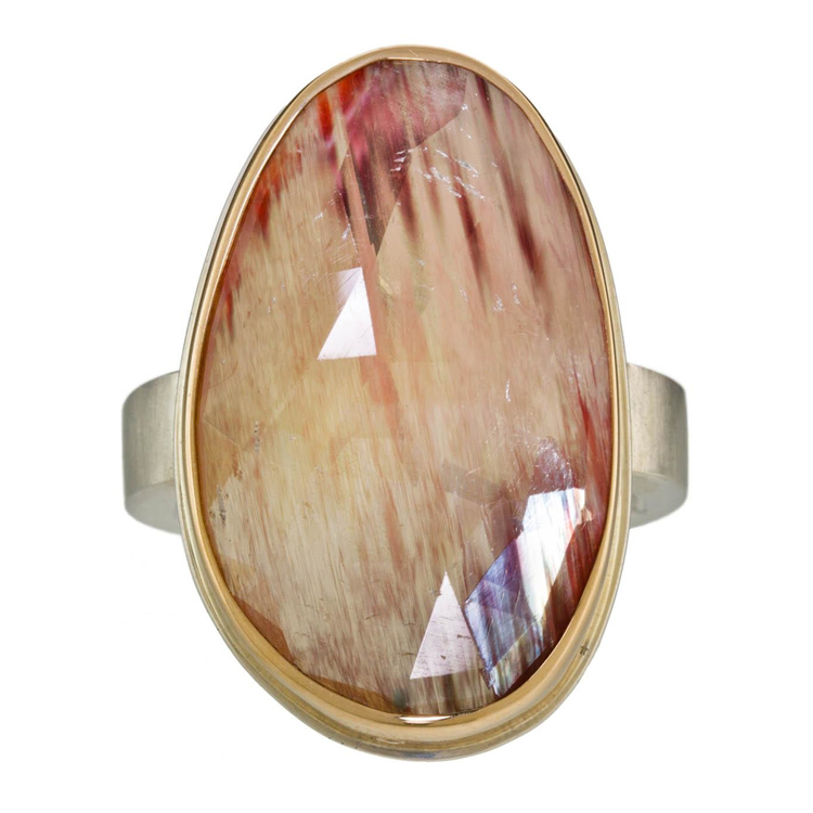 Asymmetrical andesine ring