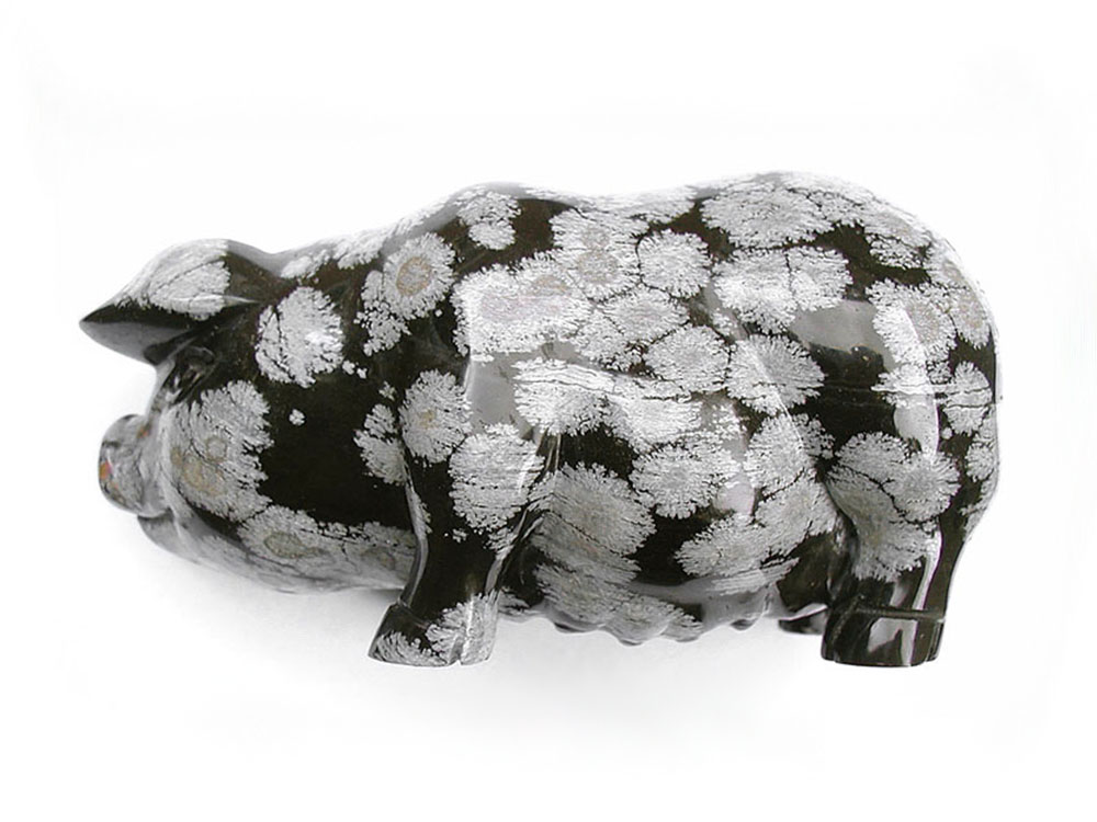 Pig carved in snowflake obsidian