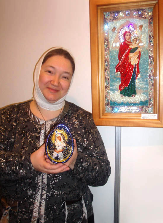 Natalia Shnitser displays her beadwork