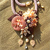 Bead and golden needle sewing art by Olga Orlova